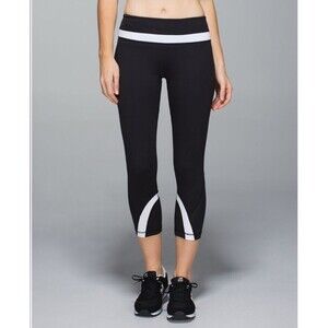 Lululemon Run: Inspire Crop II Black/white Size 4  W6830S. MSRP $89.00